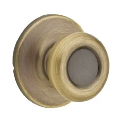 Kwikset Tylo Antique Brass Passage Door Knob Right Or Left Handed