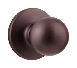 Kwikset Polo Venetian Bronze Passage Door Knob Right Or Left Handed